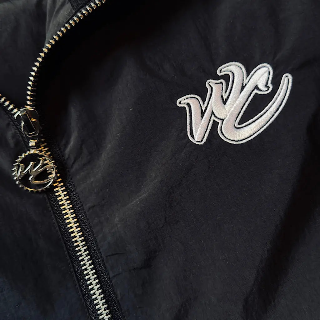Stylish nylon track jacket with embroidered Winners Circle logo